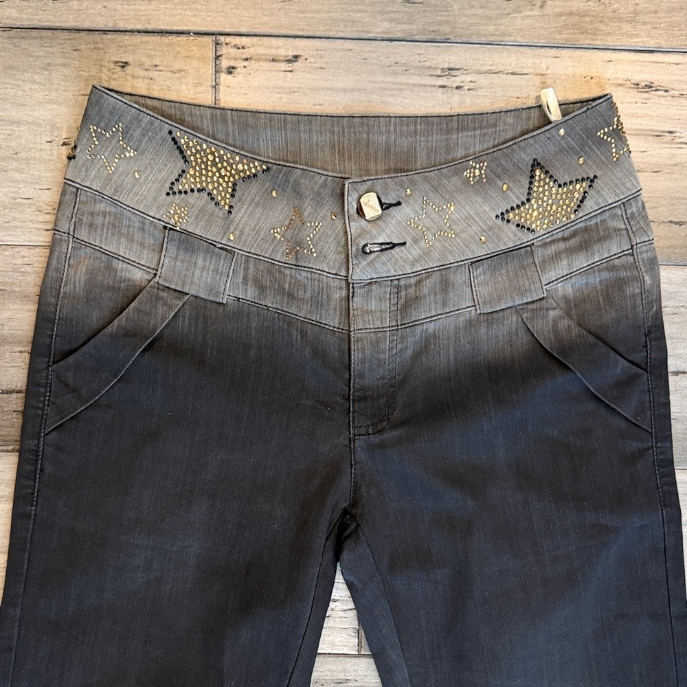 Black Flared Jeans with Star Accents - Picture 2 of 8